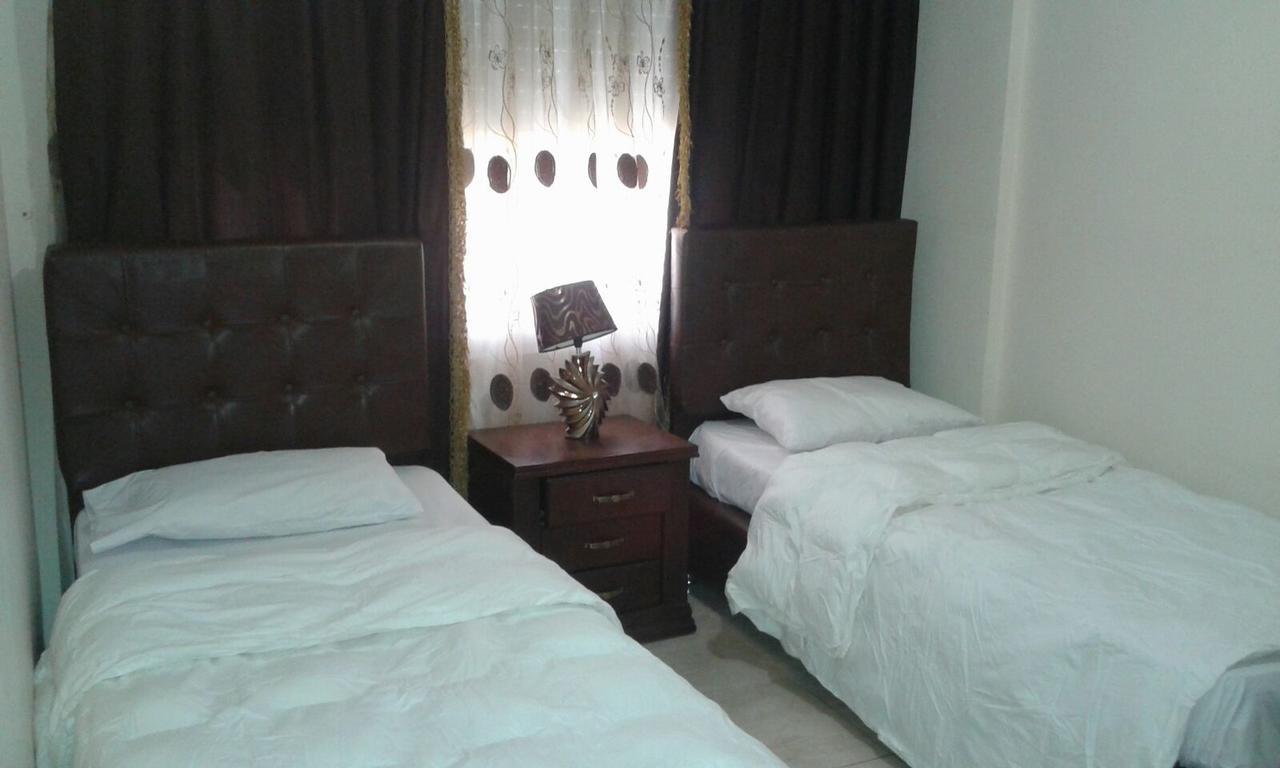 Al Tawheed Hotel Apartments アンマン エクステリア 写真