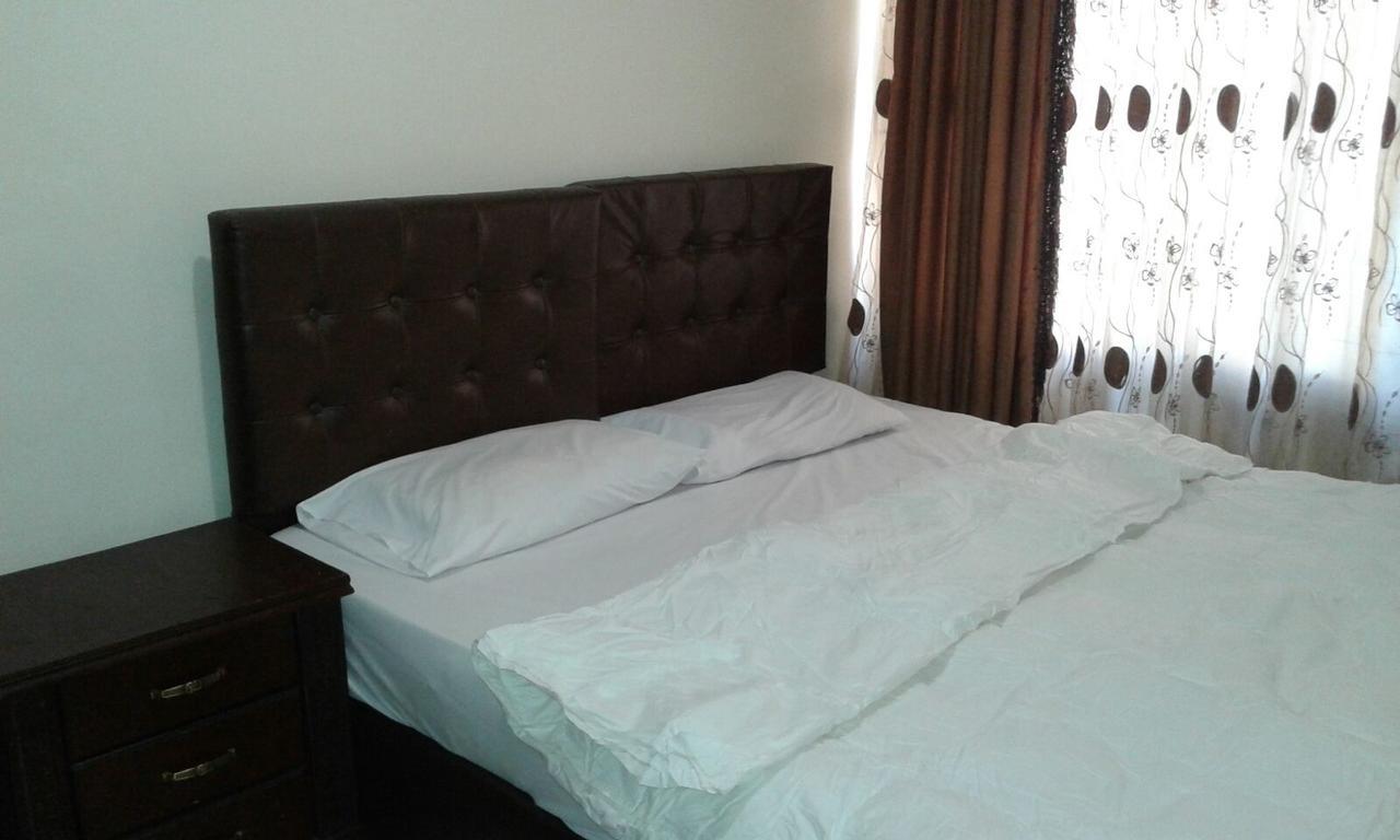 Al Tawheed Hotel Apartments アンマン エクステリア 写真