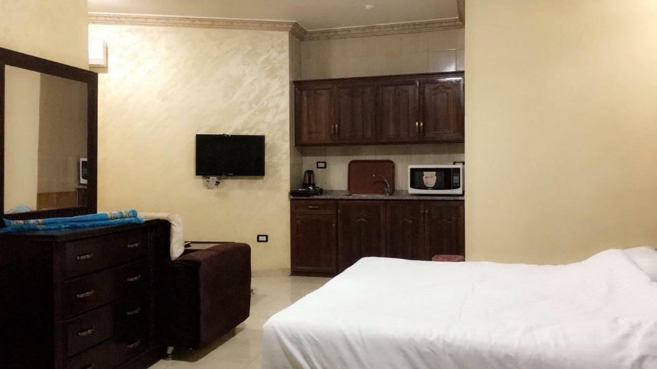 Al Tawheed Hotel Apartments アンマン エクステリア 写真