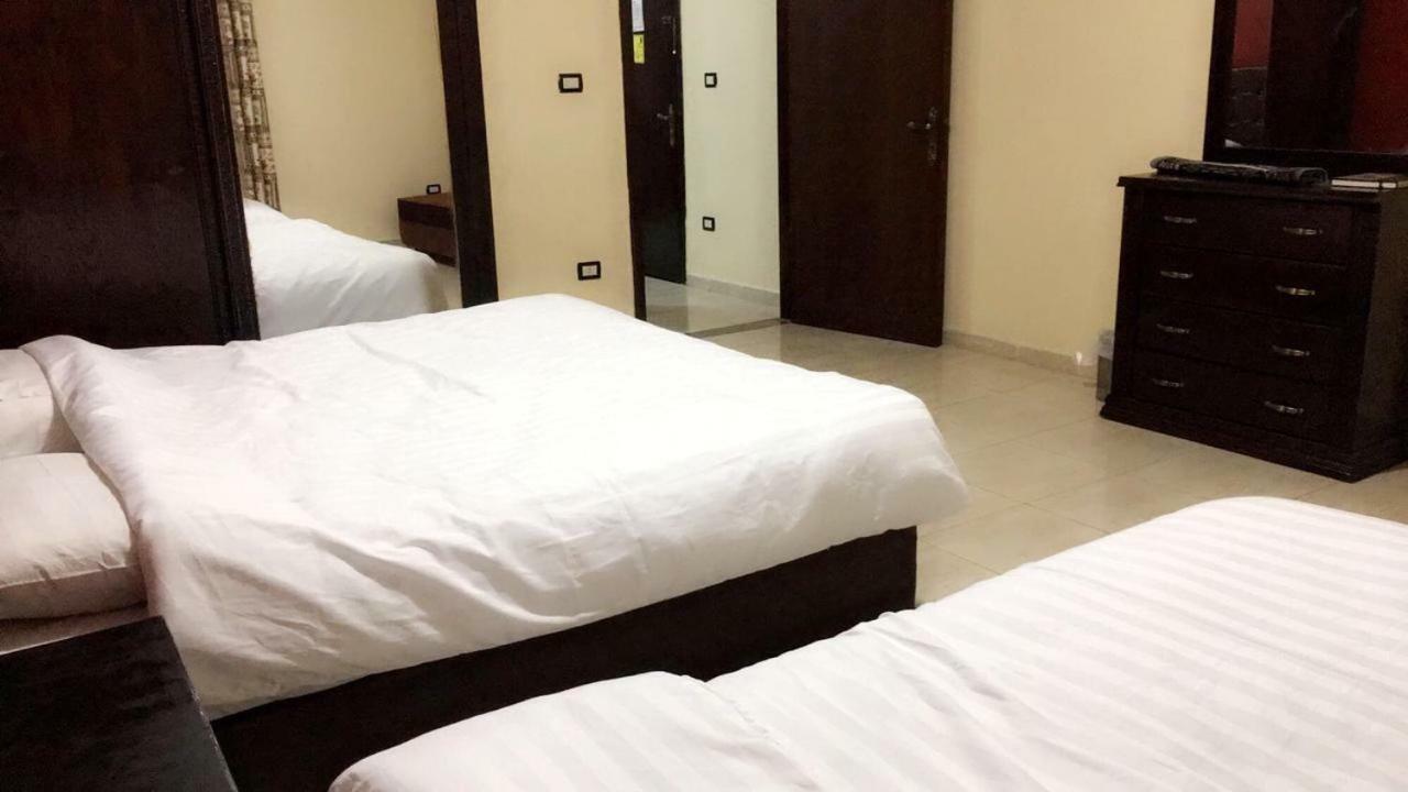 Al Tawheed Hotel Apartments アンマン エクステリア 写真